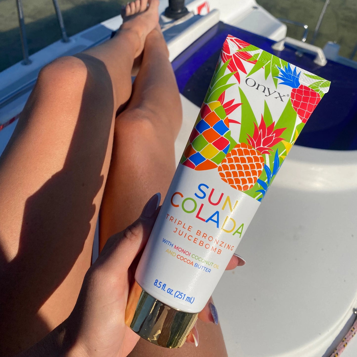Onyx SunColada bronzer inside a tanning bed, designed for deep, instant bronzing with moisturizing benefits.