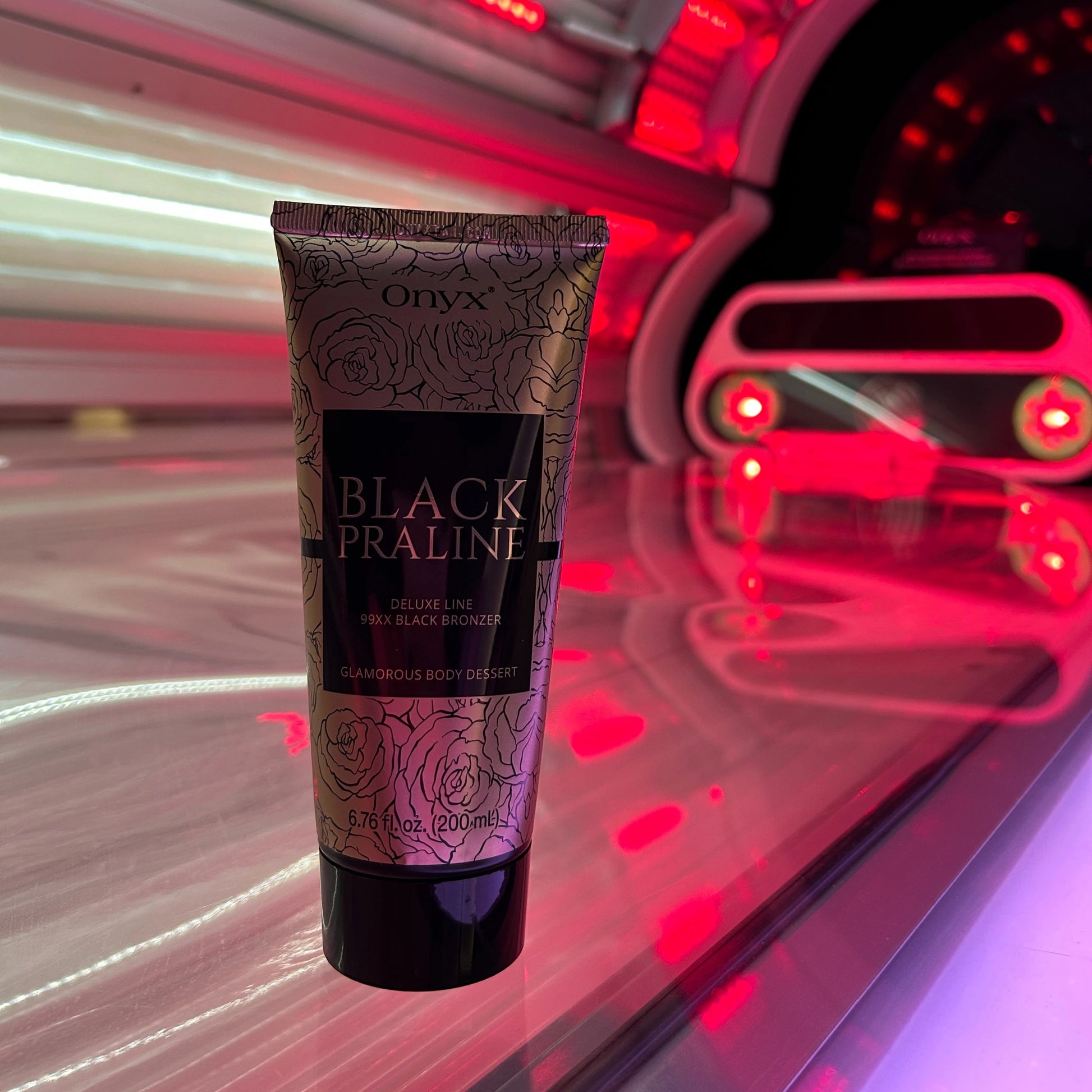 Onyx Black Praline Bronzer Lotion used outdoors, achieving a luxurious, deep bronze.