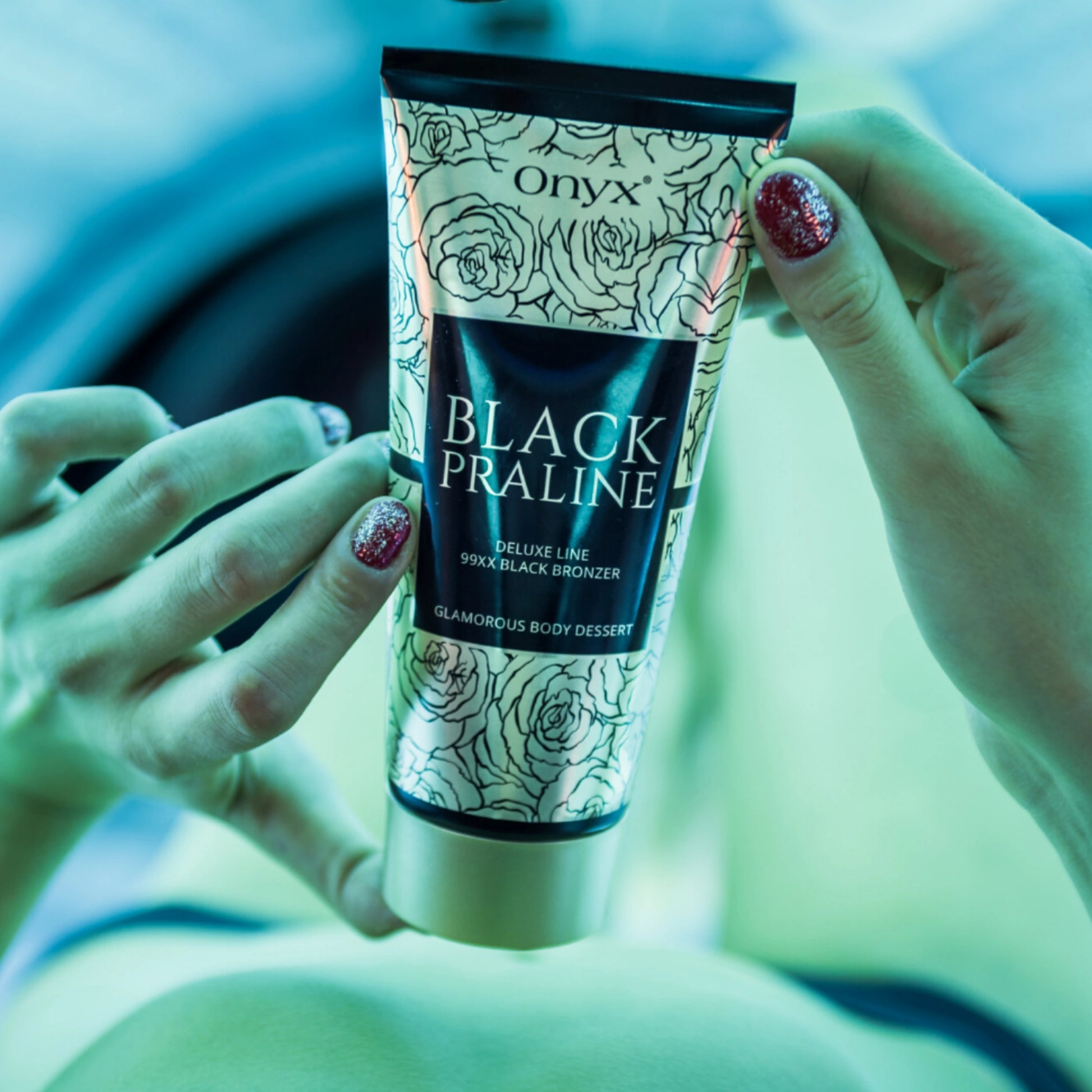 Onyx Black Praline Bronzer Lotion in a UV tanning bed, ensuring optimal skin-darkening effects.