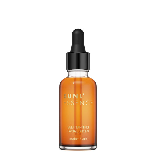 Transparent orange glass bottle of Sunl’essence self-tanning facial drops with a black dropper, labeled medium to dark shade, on a white background