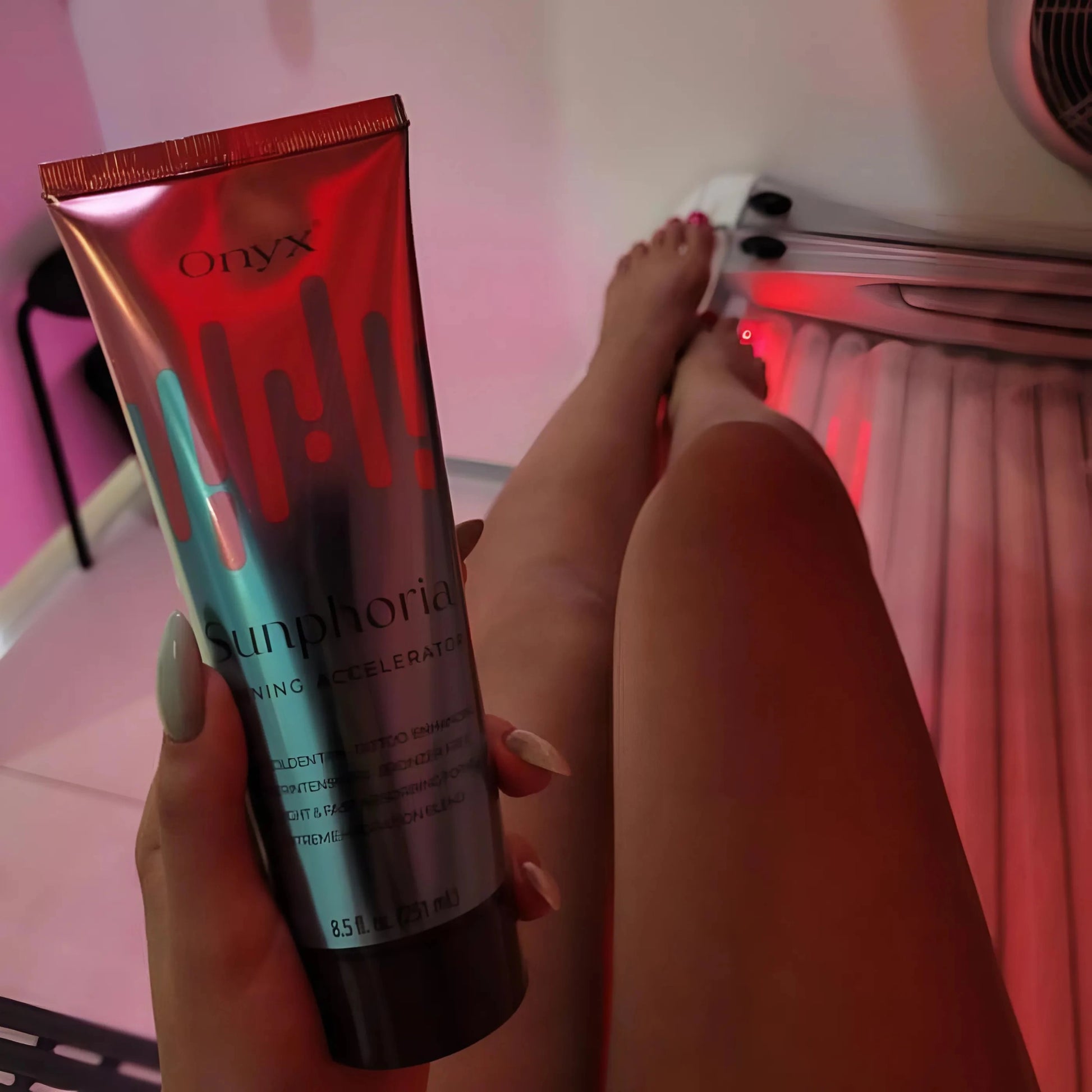 Onyx Sunphoria Tanning Accelerator in a tanning booth.