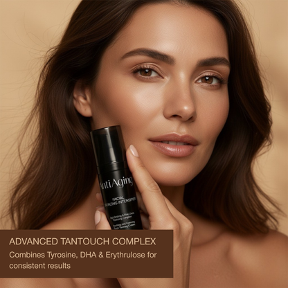 Bottle of AntiAging Face Tanning Lotion placed on silky fabric, highlighting lightweight, fast-absorbing texture.