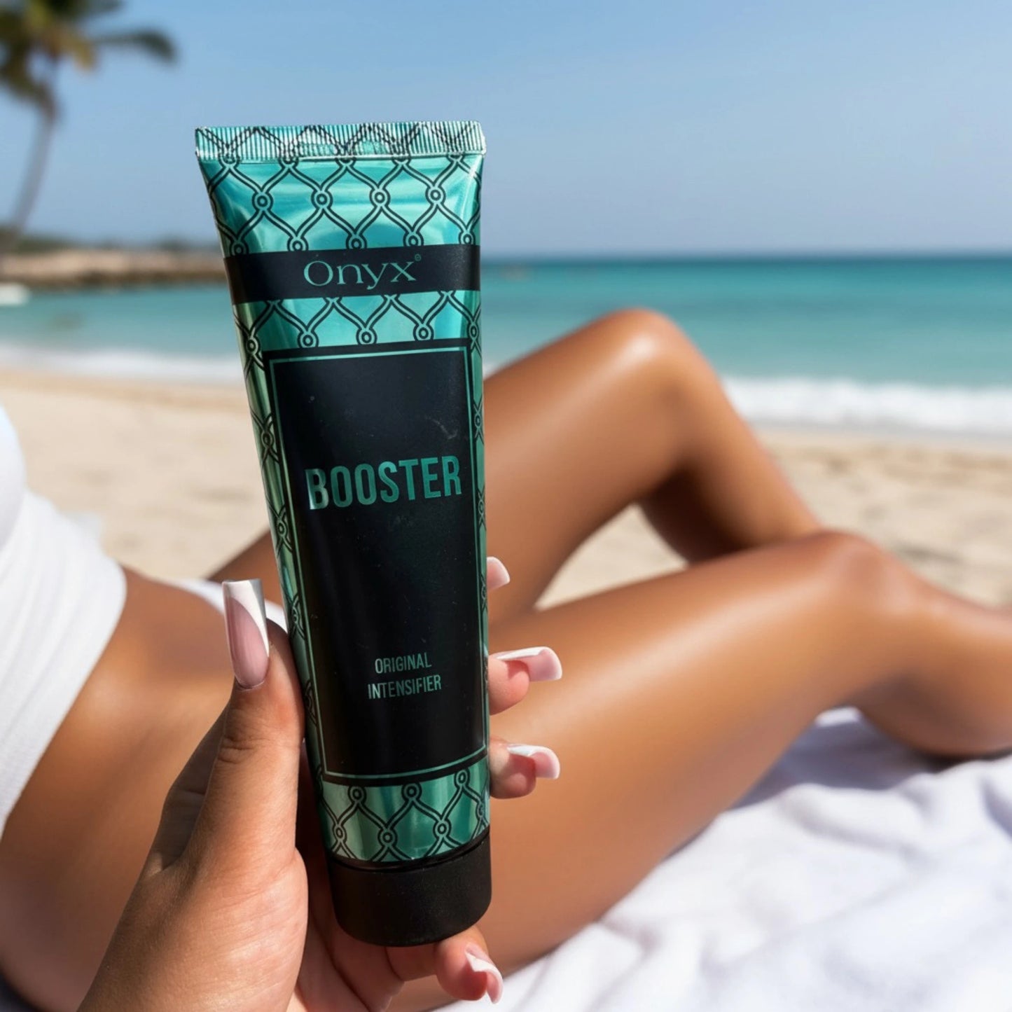 Close-up of tanning accelerator lotion on sun-kissed legs at the beach
