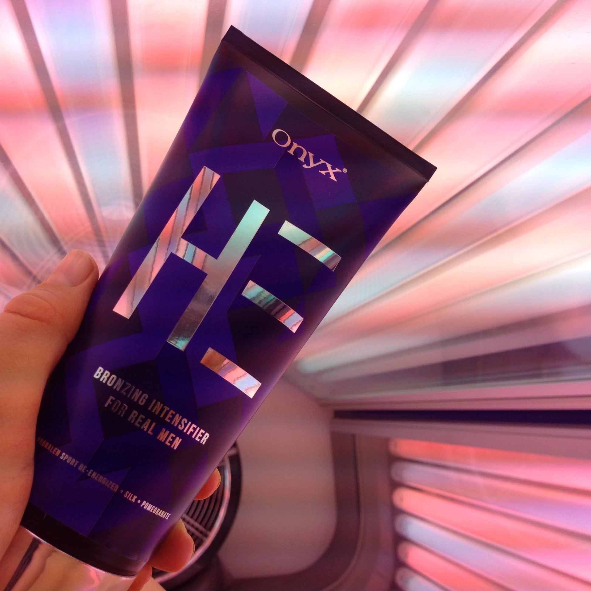 Onyx HE Men’s Bronzing Lotion inside a tanning bed – indoor tanning accelerator for a deep tan.