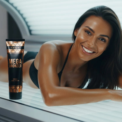 Smiling woman lying in a tanning bed with Mega Bronzer lotion placed next to her, healthy glowing skin.