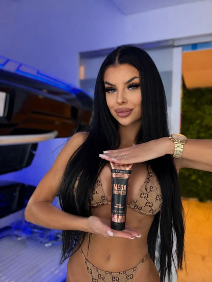 Woman holding Onyx Mega Bronzer in a tanning salon