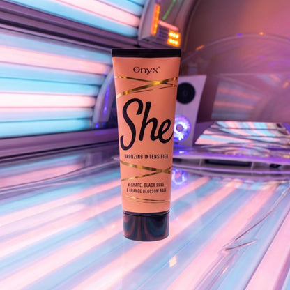Onyx SHE tanning lotion standing inside a tanning bed