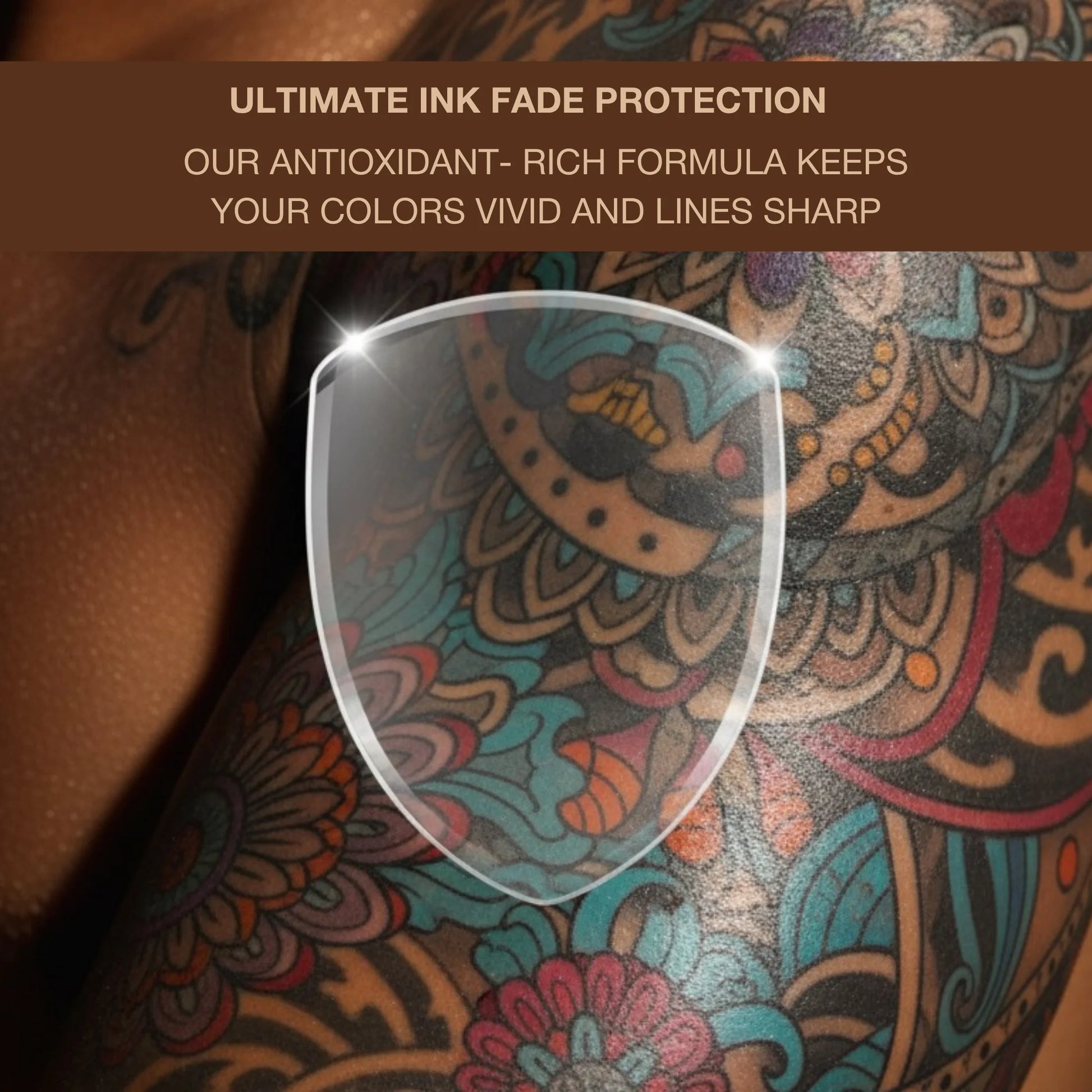Close-up of a colorful tattoo with text about ultimate ink fade protection