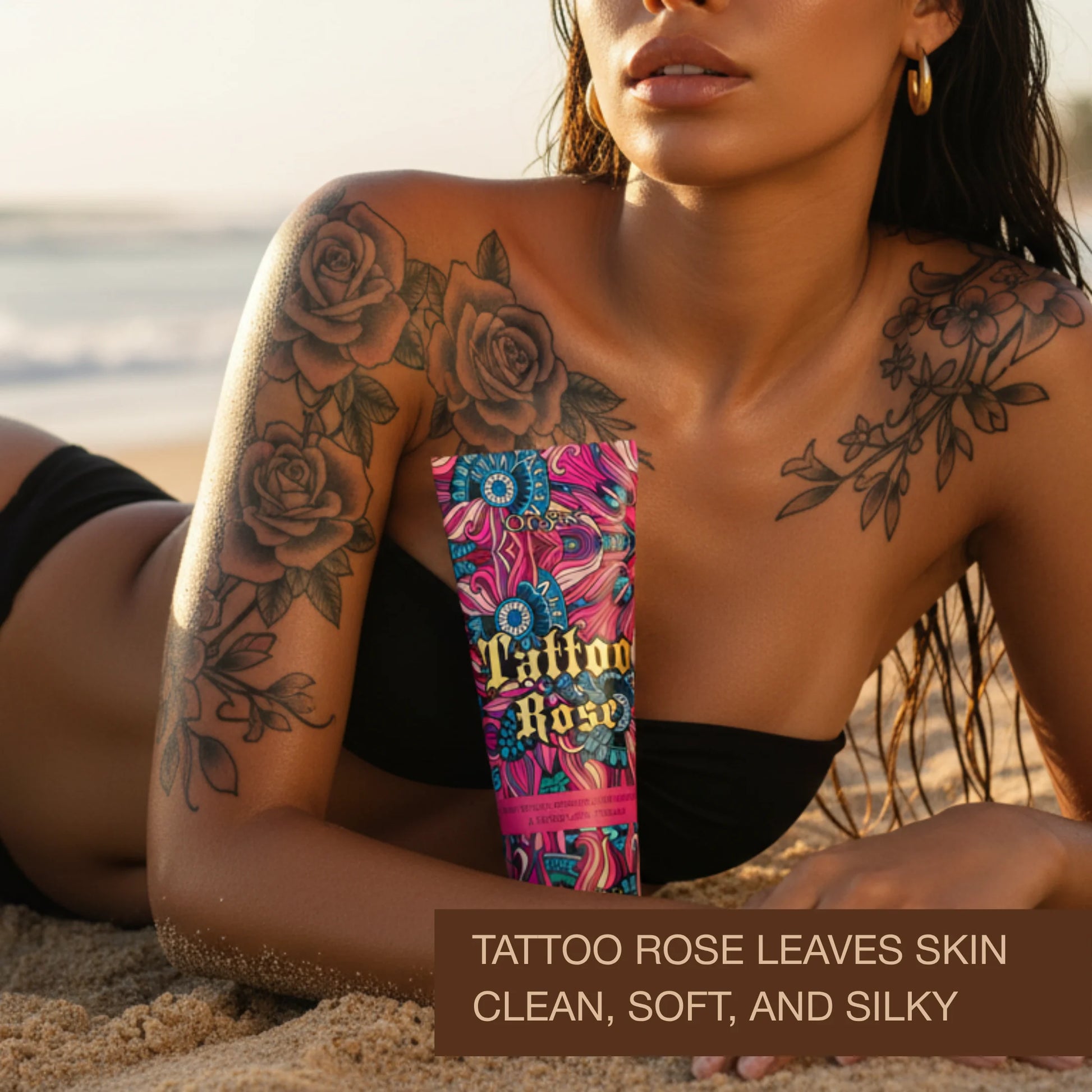 Woman with rose tattoos lying on the beach holding tanning lotion, smooth glowing skin in warm sunlight close-up.