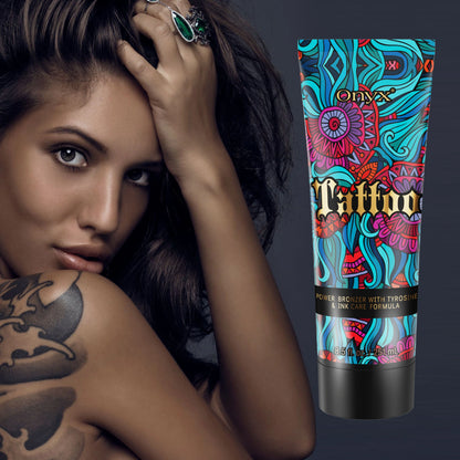 Close-up of a tattooed woman with Onyx Tattoo Tanning Lotion, enhancing ink vibrancy and bronzing results.