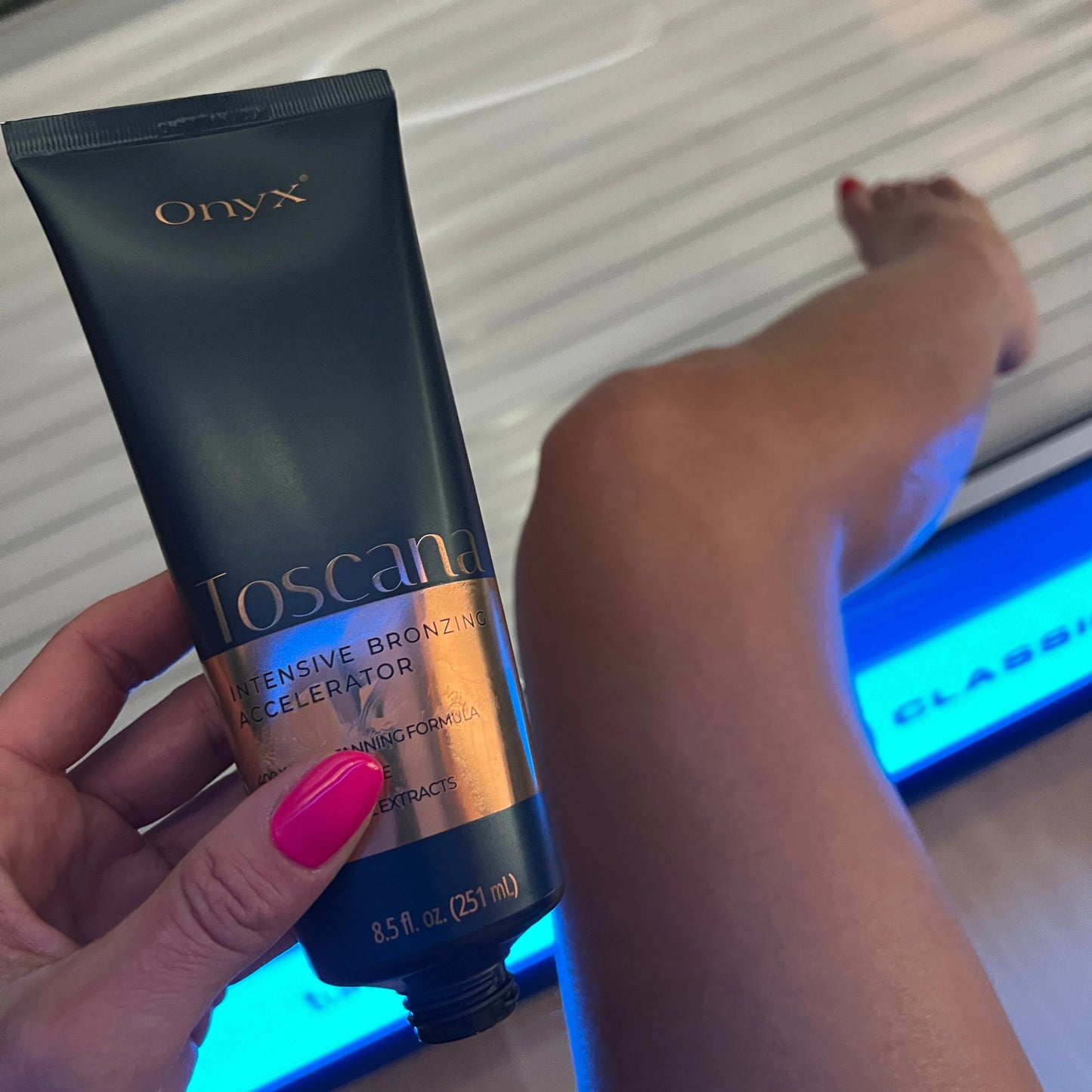 Onyx Toscana Bronzing Accelerator inside a tanning bed, maximizing UV absorption for ultra-dark tanning results.