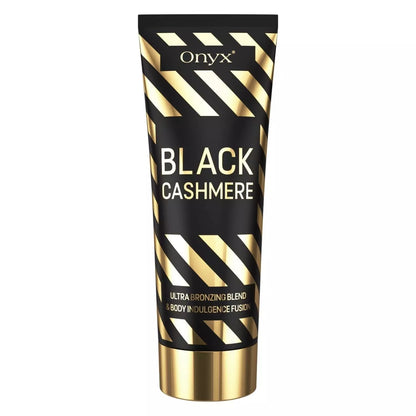 Onyx Black Cashmere tanning lotion tube shown on a white background with black and gold packaging, front label, gold cap, and striped design visible.
