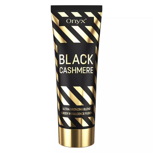 Onyx Black Cashmere tanning lotion tube shown on a white background with black and gold packaging, front label, gold cap, and striped design visible.